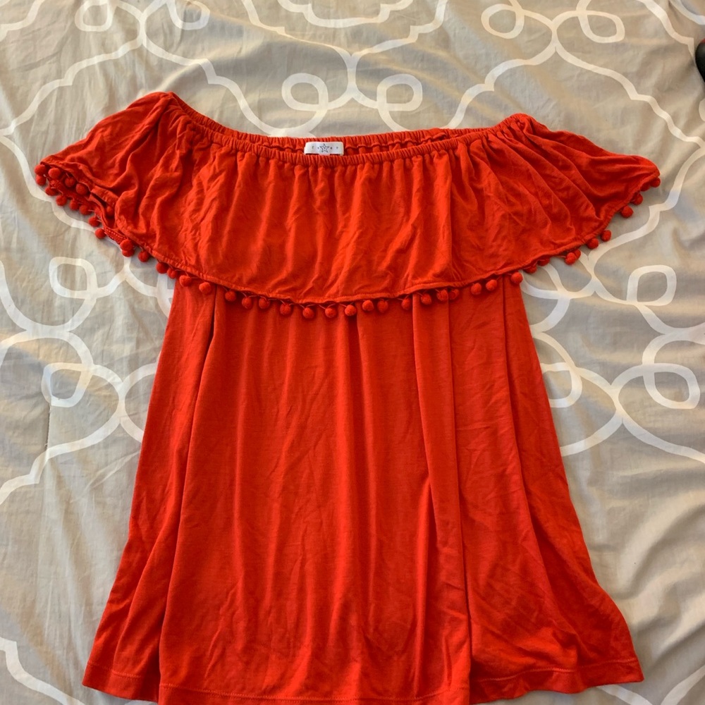 Red/orange off the shoulder top.